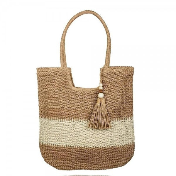 Two-tone woven straw tote bag with tassel detail and top handles in neutral shades