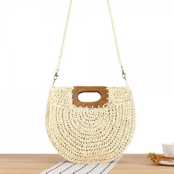 Round woven straw crossbody bag with wooden top handle and long strap