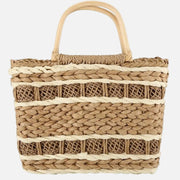 Woven basket with striped pattern on a white background
