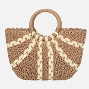 Woven straw tote bag with circular handle and fanned stripe pattern in neutral tones